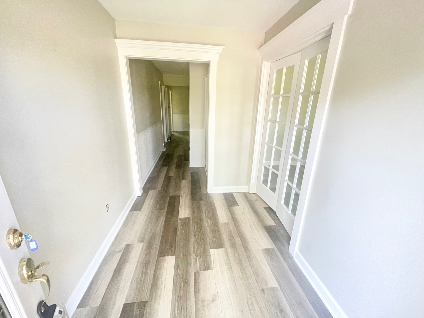 62 Fernwood Road Montgomery, IL 60538 - Photo 3 of 16 a view of a bedroom with wooden floor and stairs
