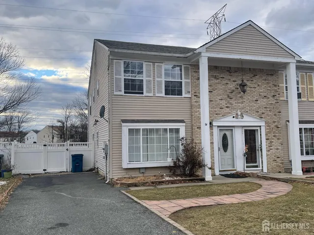 front view of a house with yard