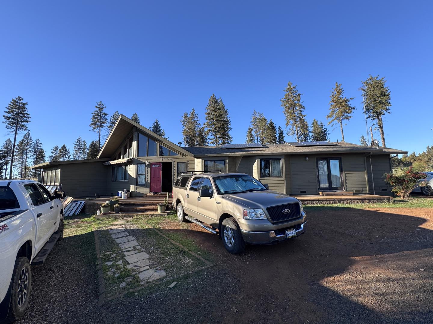 12168 Granite Ridge Road Oroville, CA 95965 - Photo 18 of 34 a front view of a house with parking space