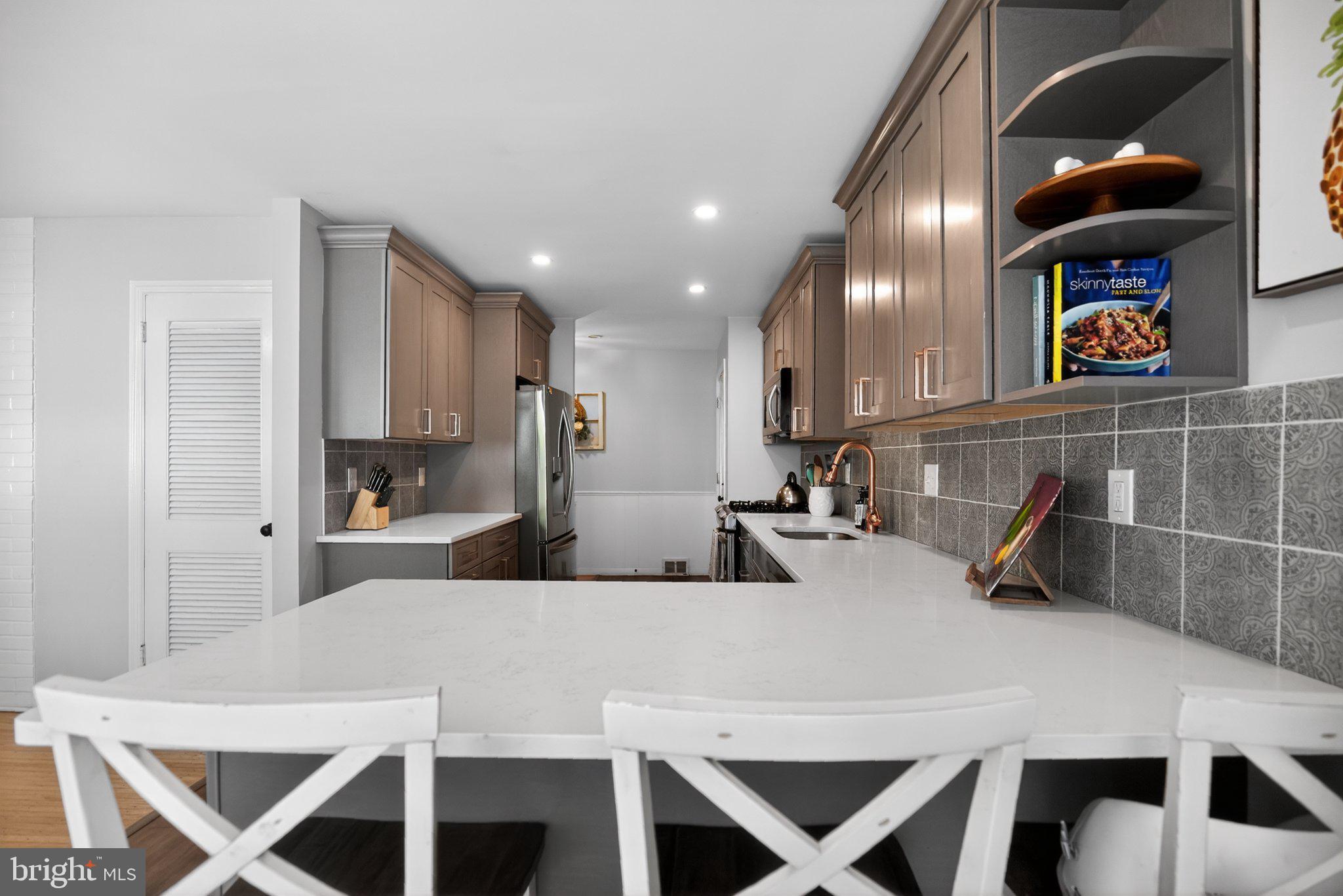 119 Sharrowvale Road Cherry Hill, NJ 08034 - Photo 23 of 36 Modern kitchen with sleek finishes.