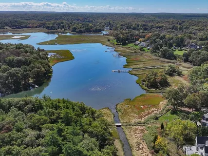 an aerial view of ocean residential house and ocean view