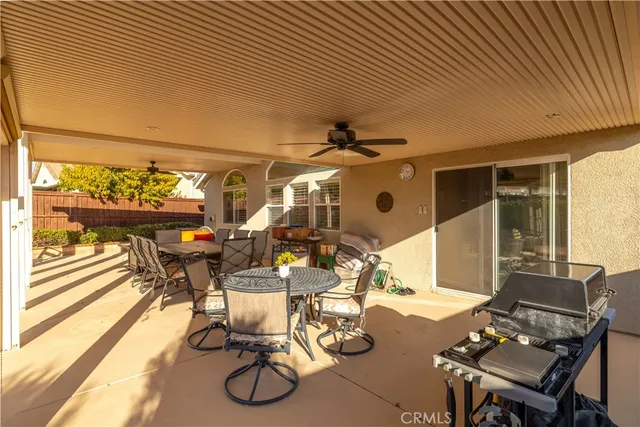 a view of swimming pool and trees in the background