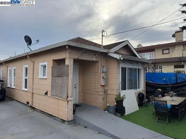 a front view of a house with patio