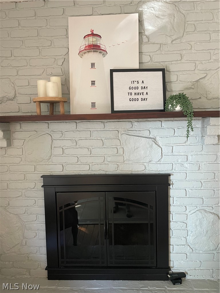 9461 Hoose Road Mentor, OH 44060 - Photo 13 of 28 Main level gas fireplace