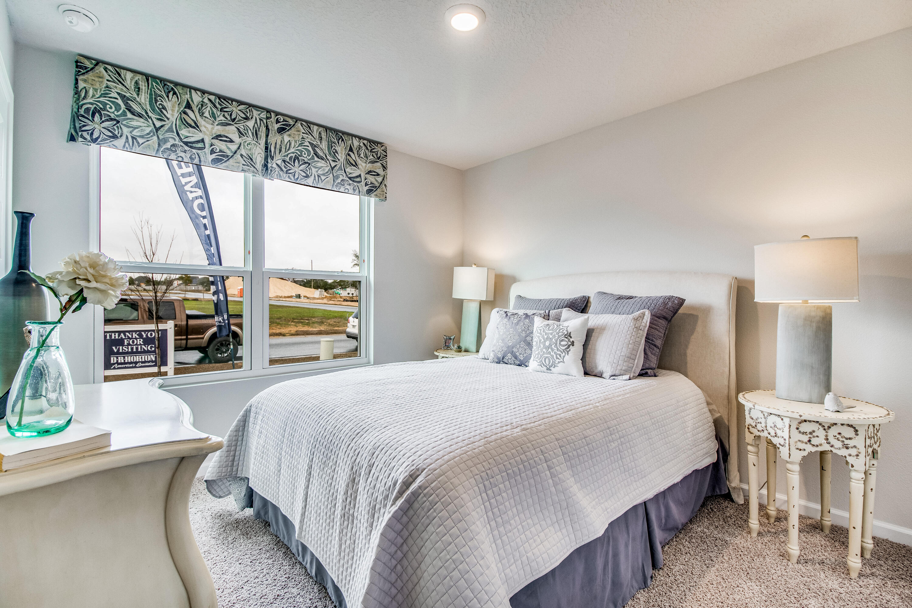 6348 Firefly Drive Milton, FL 32583 - Photo 17 of 31 a bedroom with a bed and a table