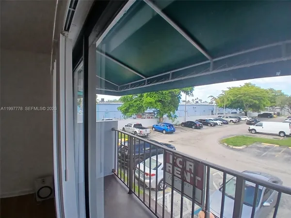 a view of a swimming pool with a porch