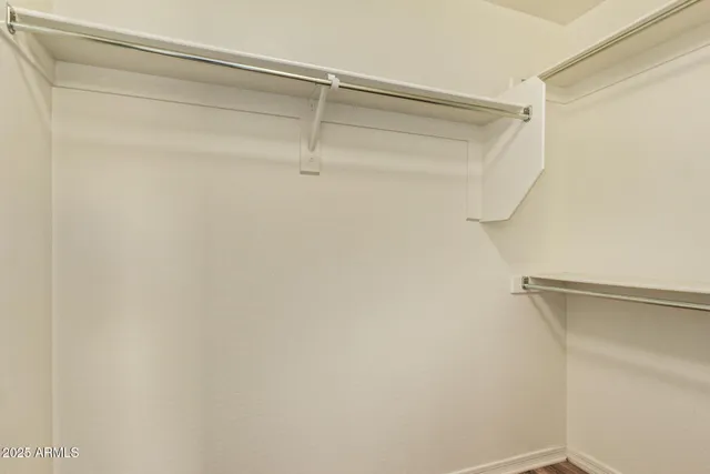 a view of a room with racks on the wall