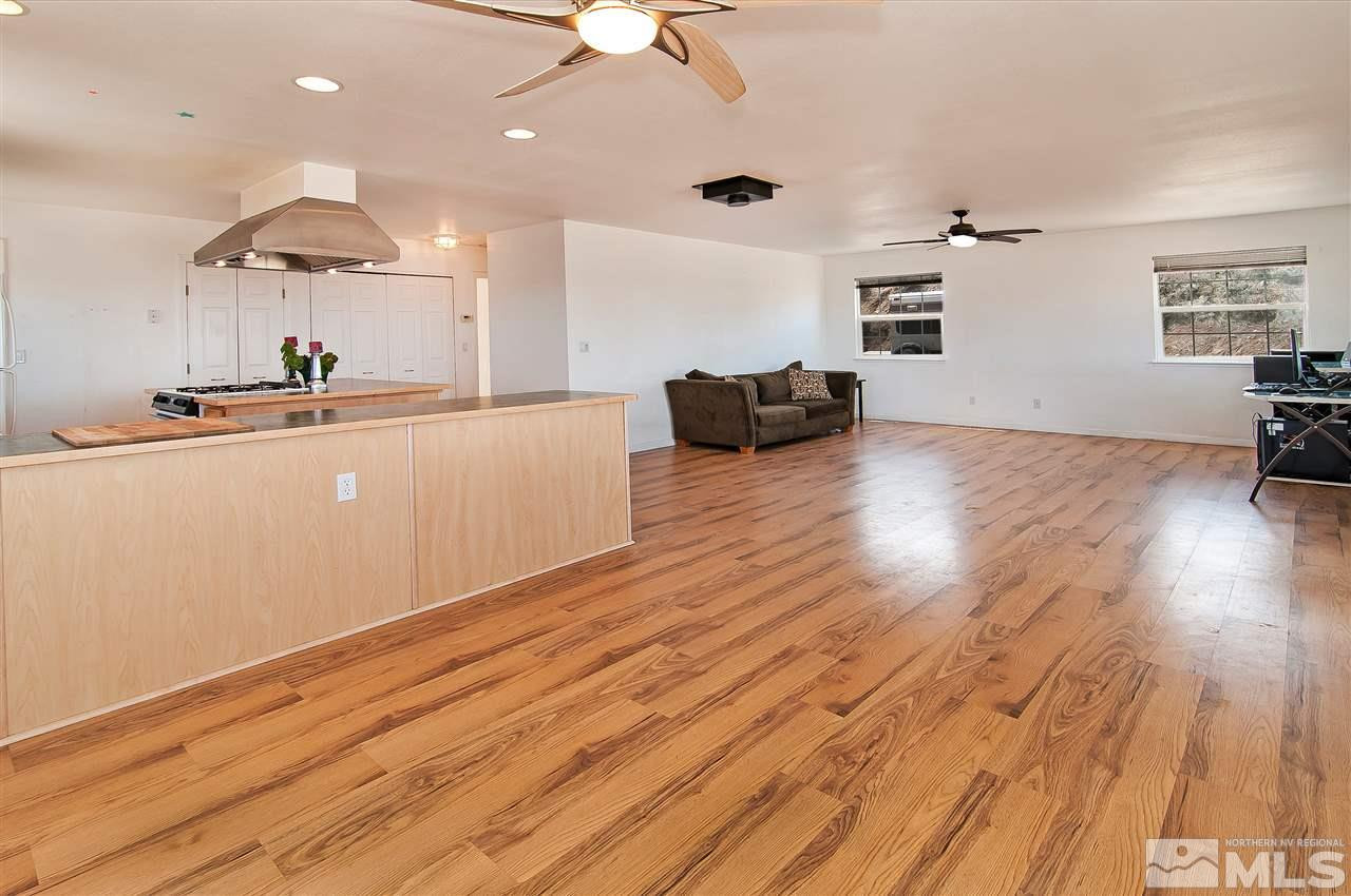 90 Bobcat Hill Road Reno, NV 89508 - Photo 6 of 24 a living room with furniture and a wooden floor