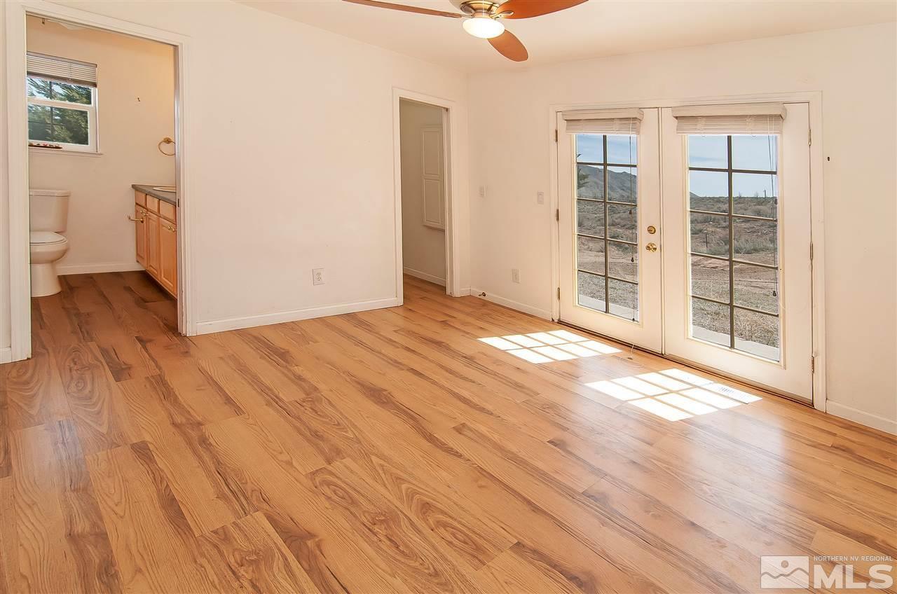90 Bobcat Hill Road Reno, NV 89508 - Photo 7 of 24 a view of empty room with wooden floor
