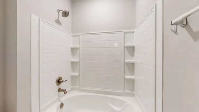 an aerial view of a house with swimming pool and sitting space