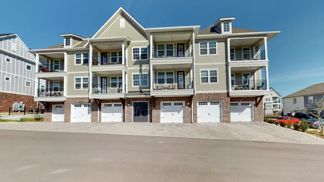 a view of a building with a street