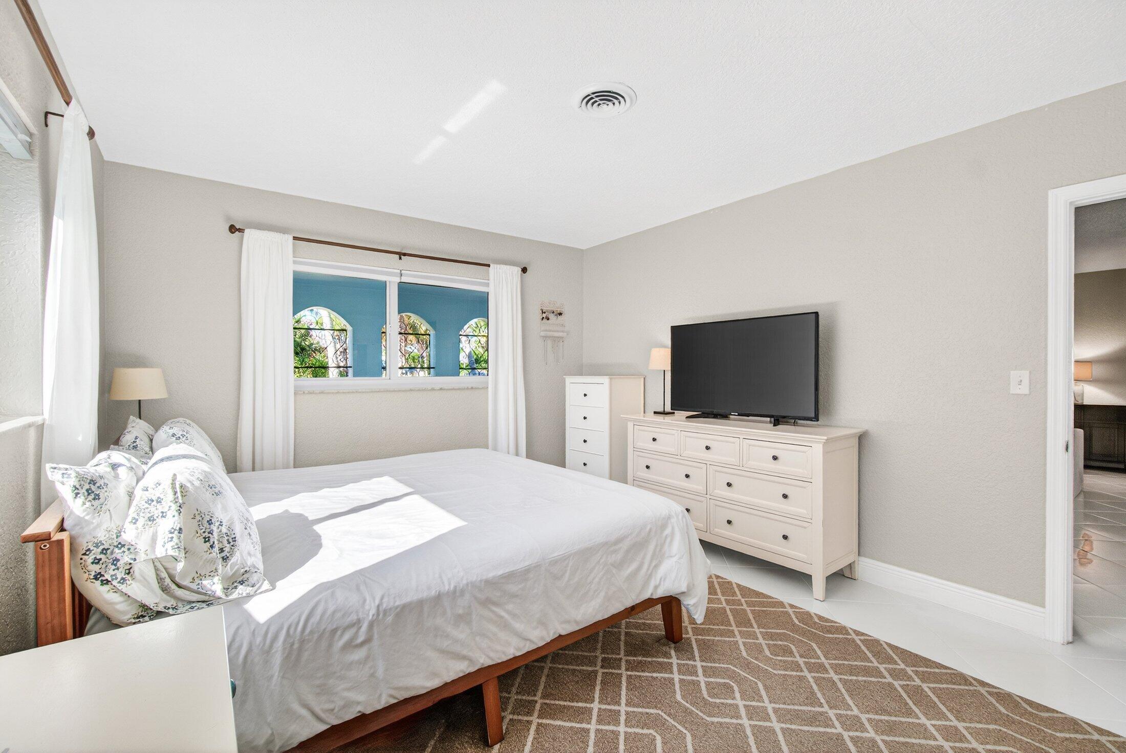 1200 Southwest 12th Terrace Boca Raton, FL 33486 - Photo 17 of 29 Primary bedroom facing west