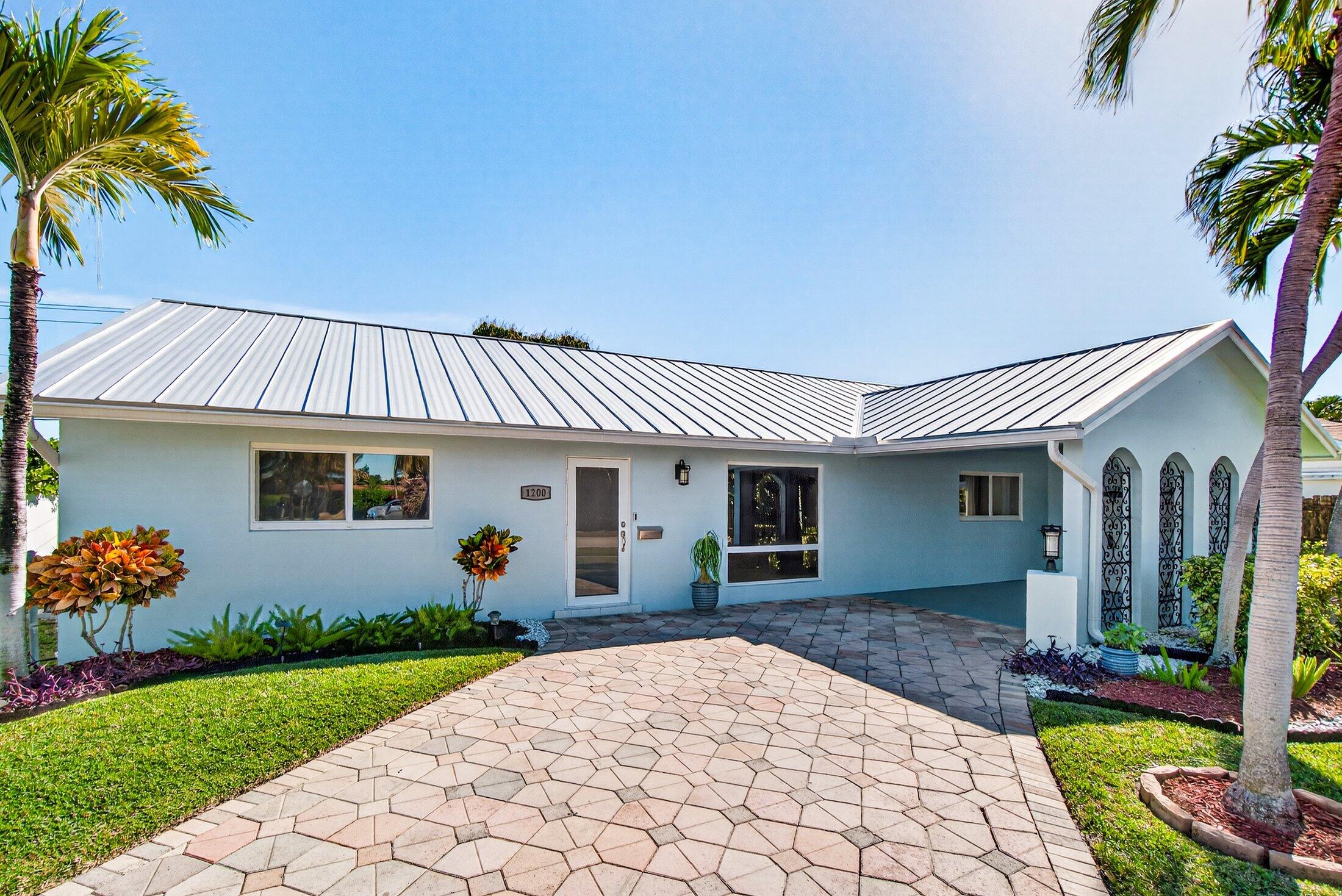 1200 Southwest 12th Terrace Boca Raton, FL 33486 - Photo 2 of 29 Front view with long driveway.