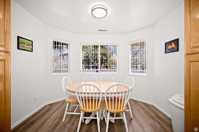 1825 West Mathis Park Place, Unit 46 St. George, UT 84770 - Photo 14 of 45 Dining area featuring wood finished floors and baseboards