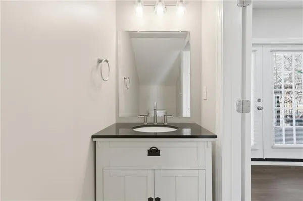 a view of a hallway with a sink
