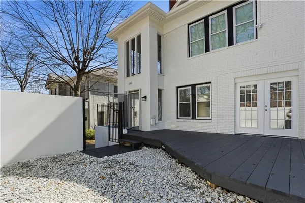 a view of a house with a snow on the road