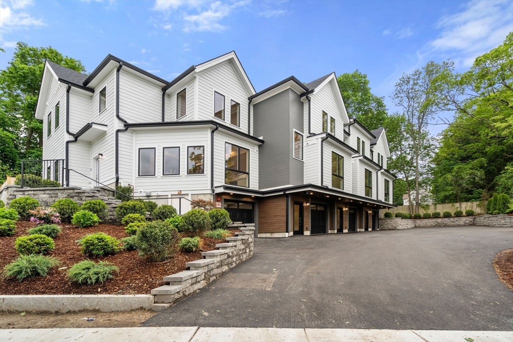 2202 Commonwealth Avenue, Unit 2 Newton, MA 02466 - Photo 2 of 23 front view of a house with a street