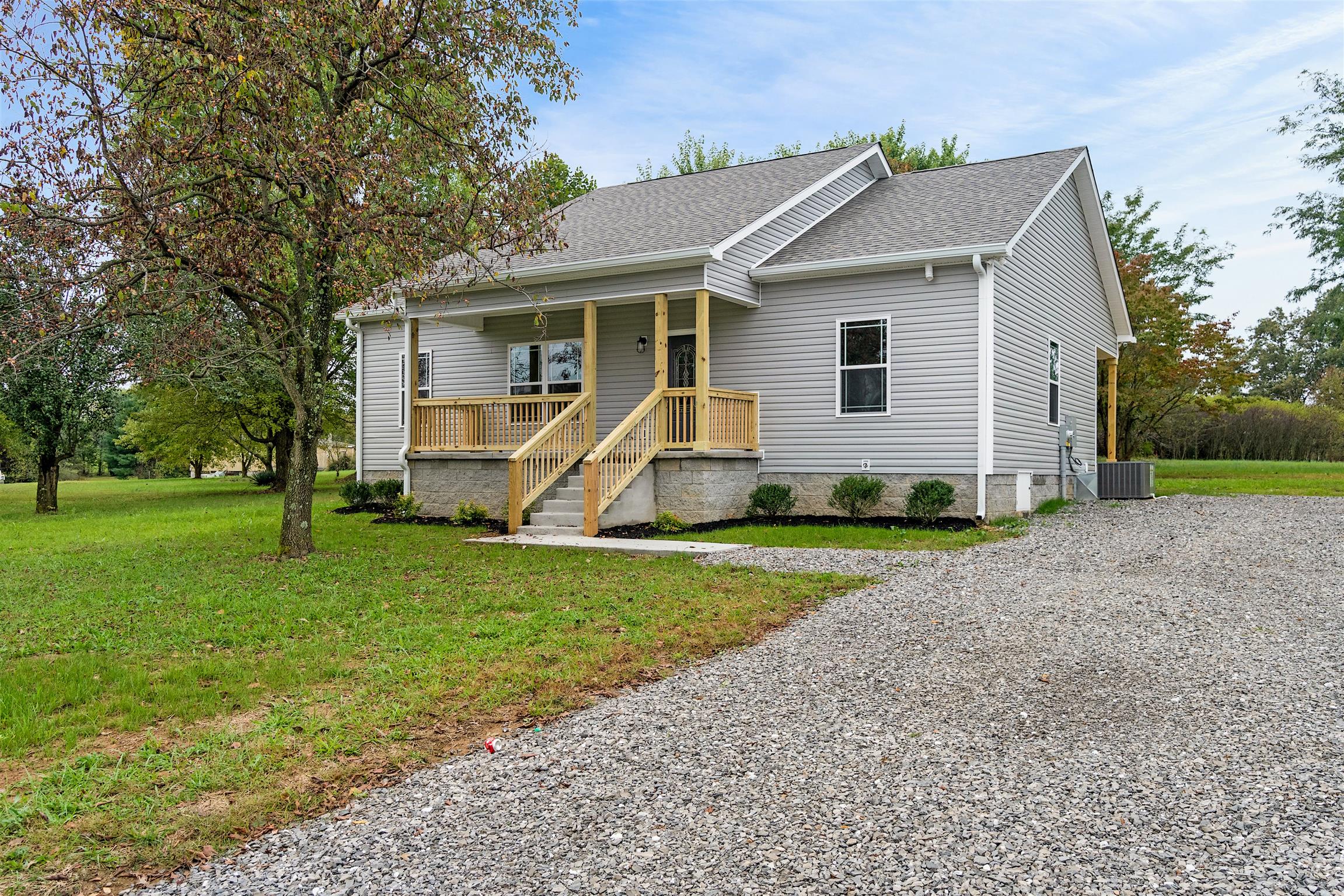 4760 Somerville Road Cross Plains, TN 37049 - Photo 1 of 30 a view of a house with a yard
