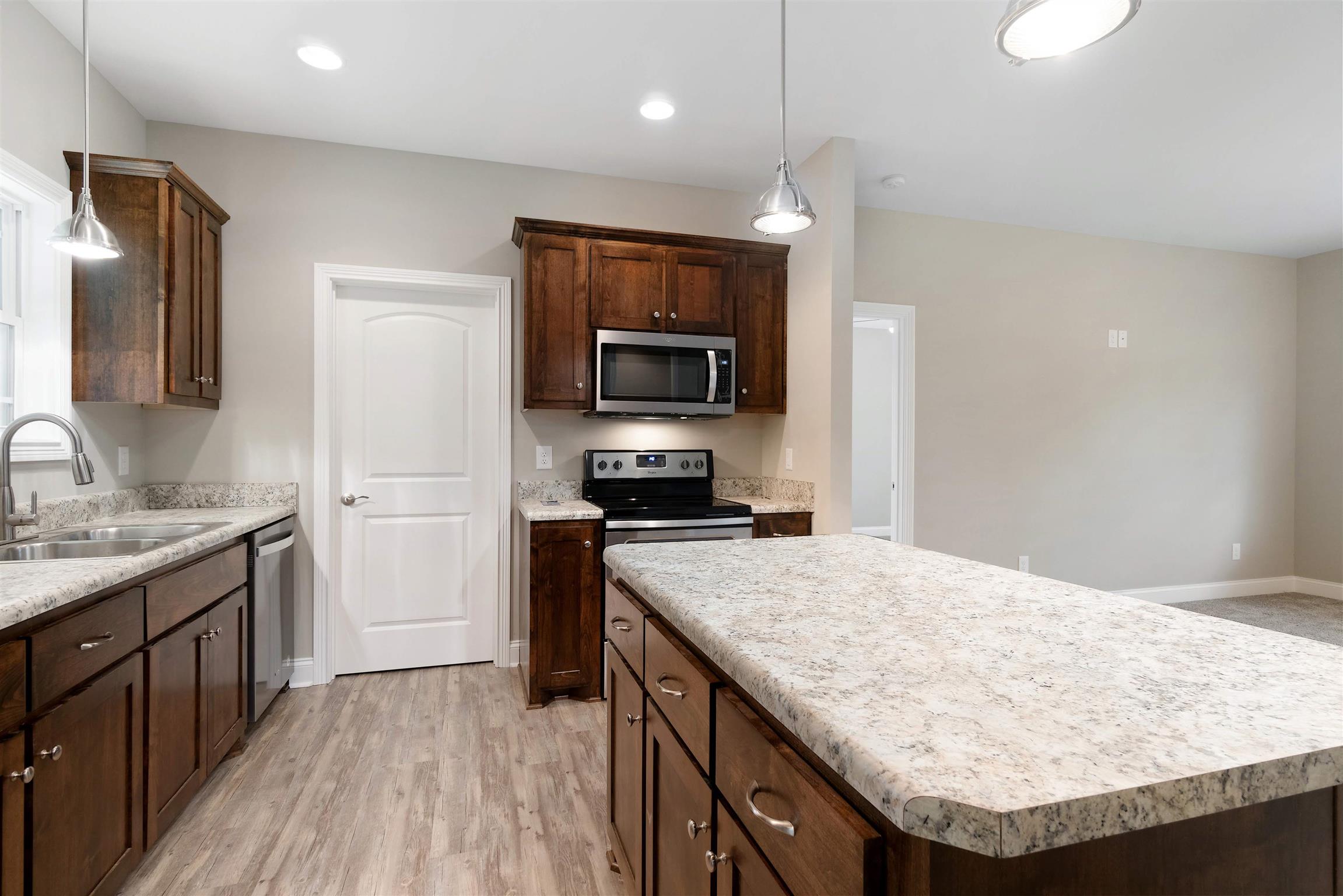 4760 Somerville Road Cross Plains, TN 37049 - Photo 12 of 30 a kitchen with a sink stove and refrigerator