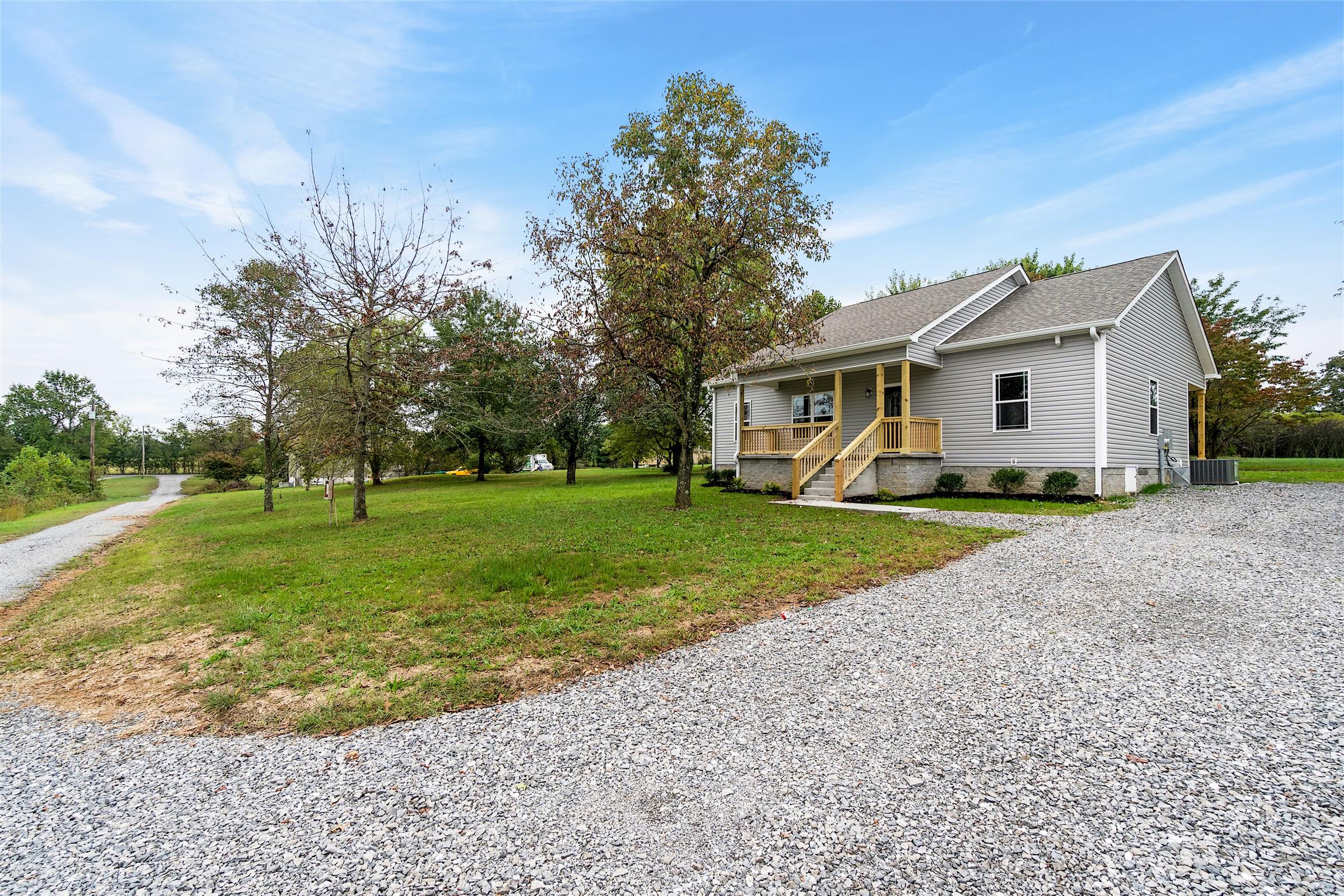 4760 Somerville Road Cross Plains, TN 37049 - Photo 2 of 30 a front view of house with yard and green space