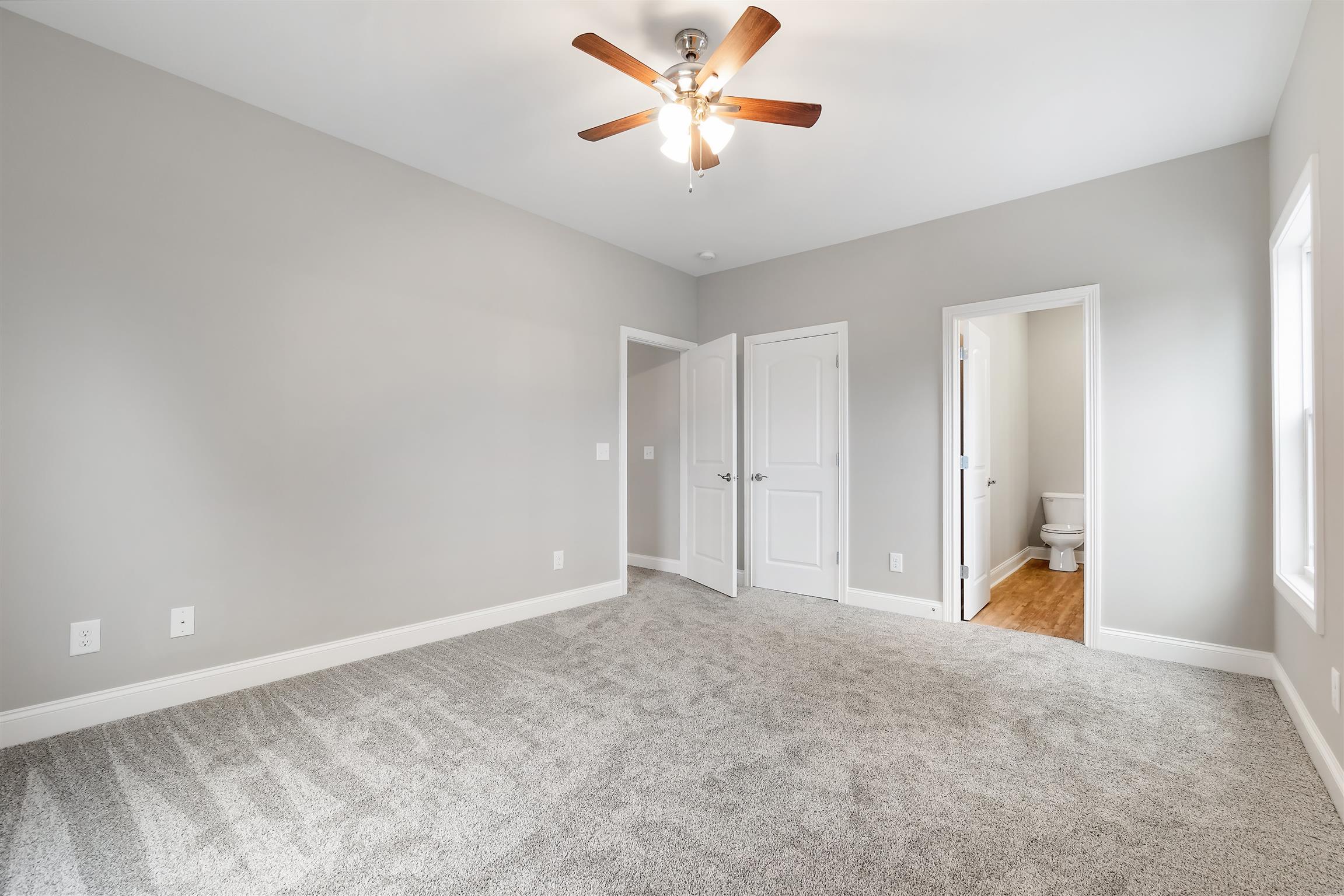 4760 Somerville Road Cross Plains, TN 37049 - Photo 24 of 30 a view of an empty room and a ceiling fan