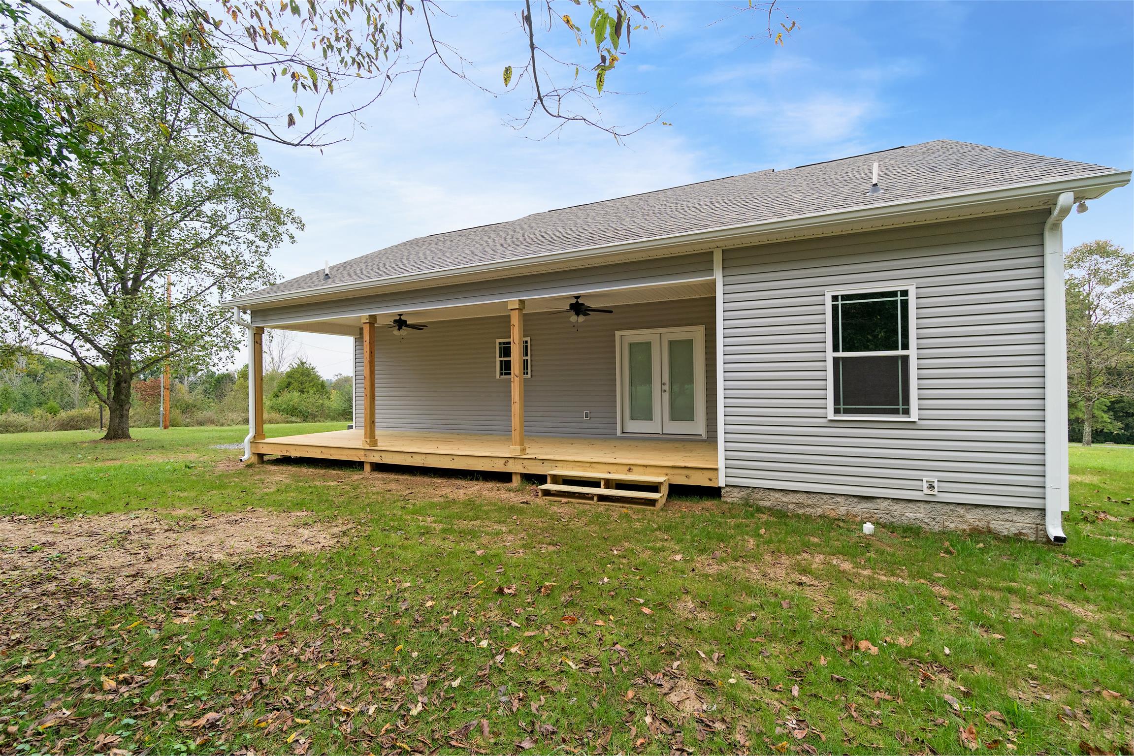 4760 Somerville Road Cross Plains, TN 37049 - Photo 5 of 30 a backyard of a house with lots of green space