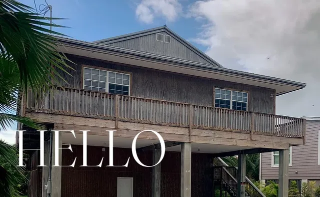 a front view of building with retail shops