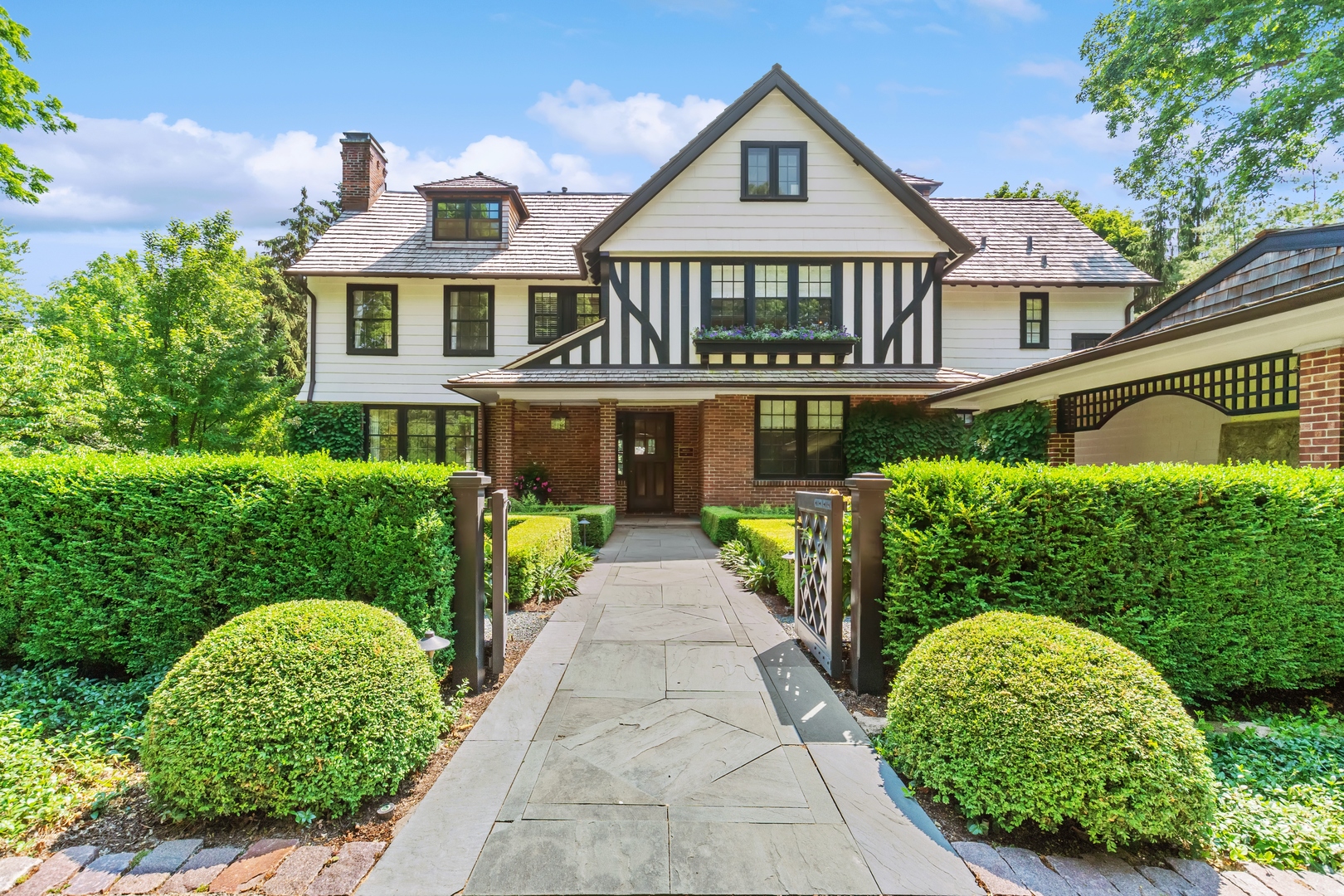 front view of a house with a yard