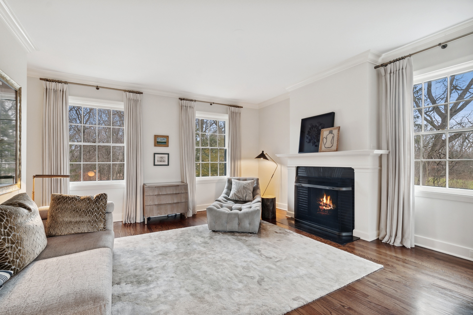 1296 North Green Bay Road Lake Forest, IL 60045 - Photo 40 of 69 a living room with furniture and a fireplace
