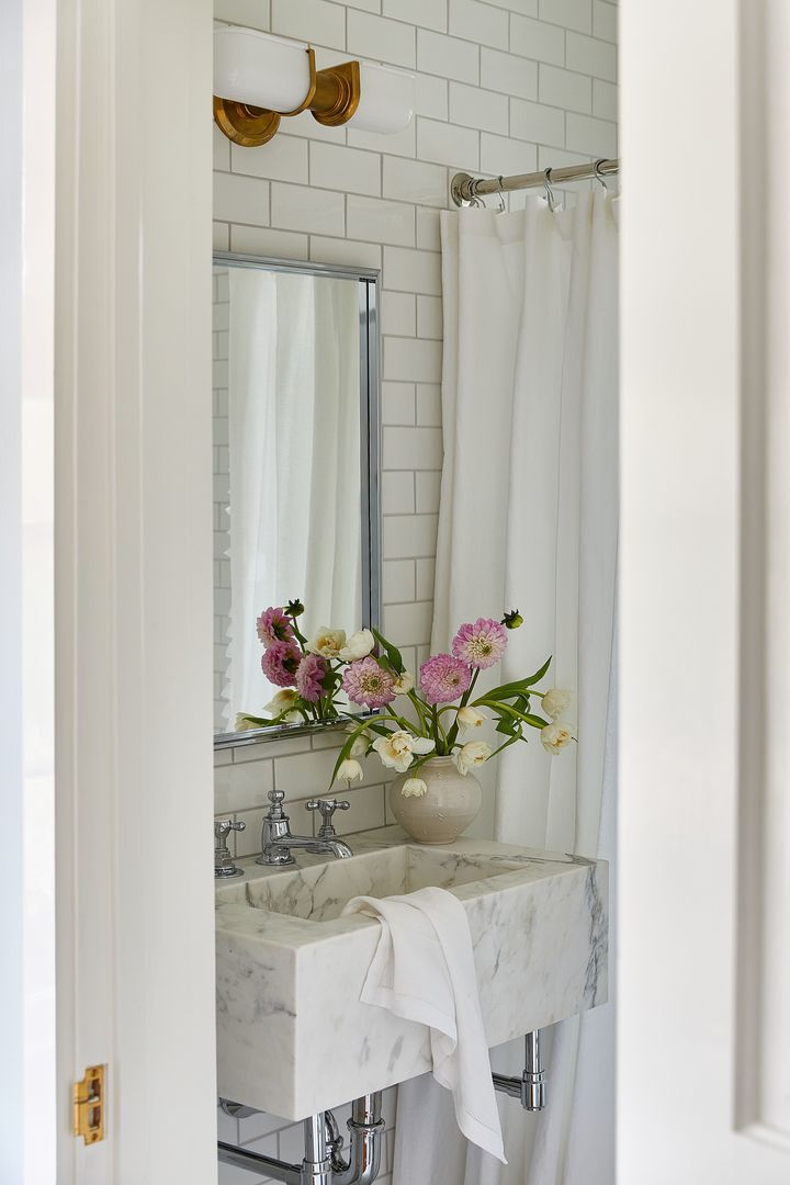 1296 North Green Bay Road Lake Forest, IL 60045 - Photo 46 of 69 a bathroom with a sink and a mirror