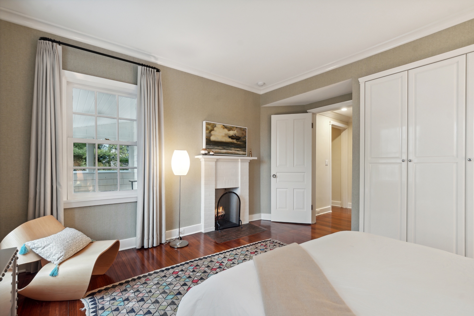 1296 North Green Bay Road Lake Forest, IL 60045 - Photo 51 of 69 a bedroom with furniture and a window