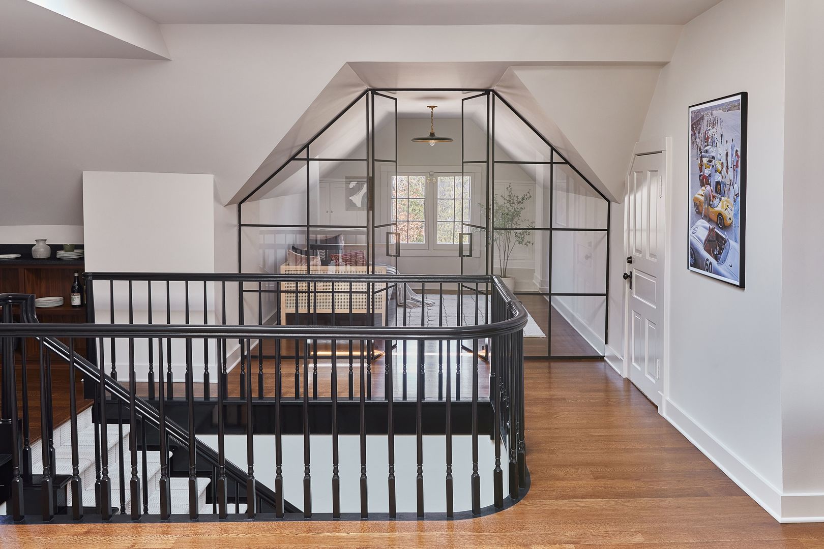 1296 North Green Bay Road Lake Forest, IL 60045 - Photo 54 of 69 a view of staircase with railing and a chandelier