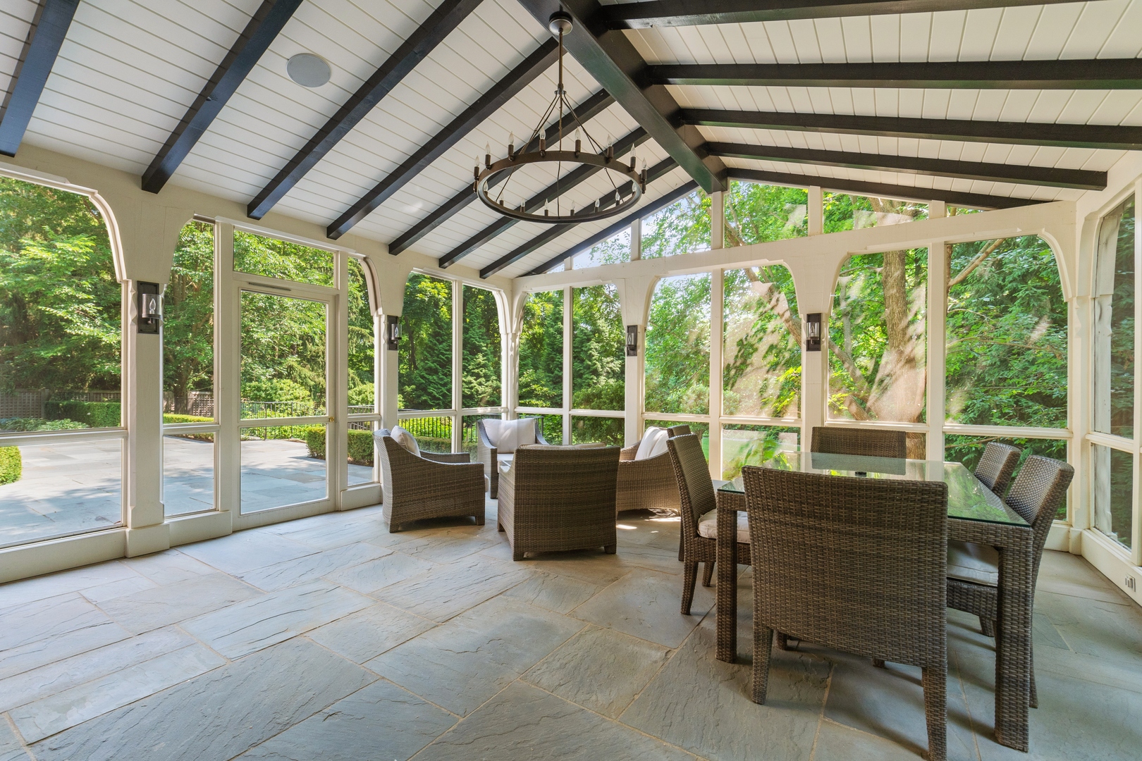 1296 North Green Bay Road Lake Forest, IL 60045 - Photo 62 of 69 a view of a porch with furniture and a yard