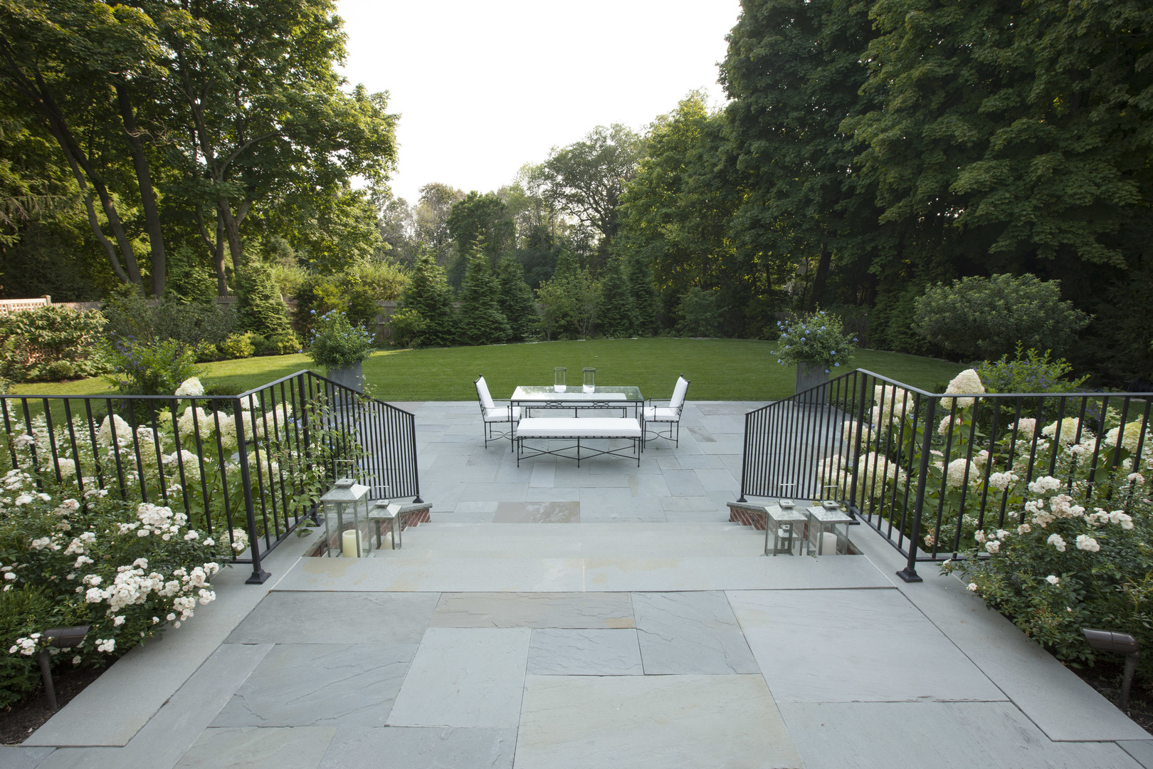 1296 North Green Bay Road Lake Forest, IL 60045 - Photo 67 of 69 a view of a chairs and table in the garden
