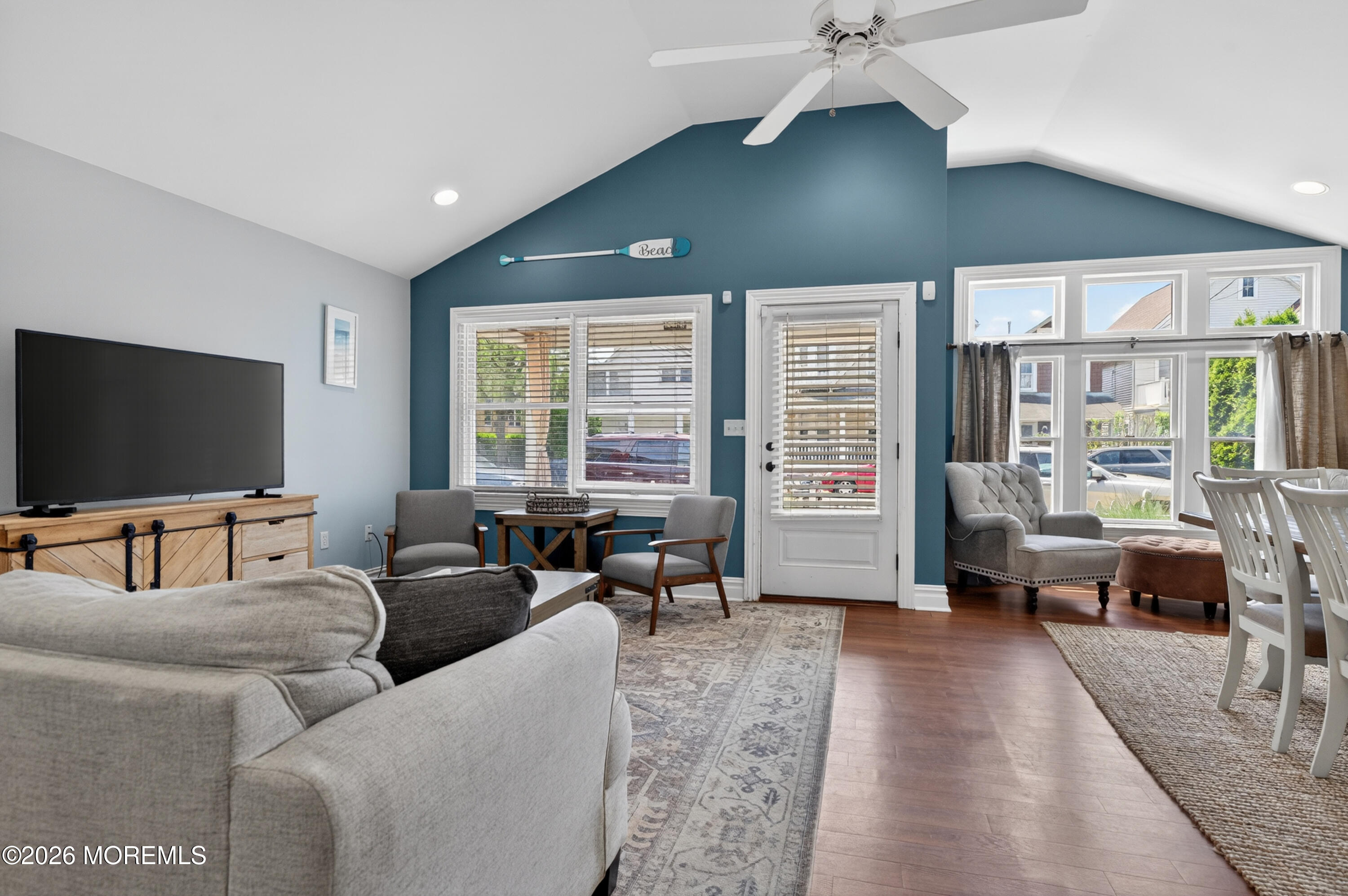 65 Heck Avenue Ocean Grove, NJ 07756 - Photo 11 of 37 a living room with furniture and a flat screen tv