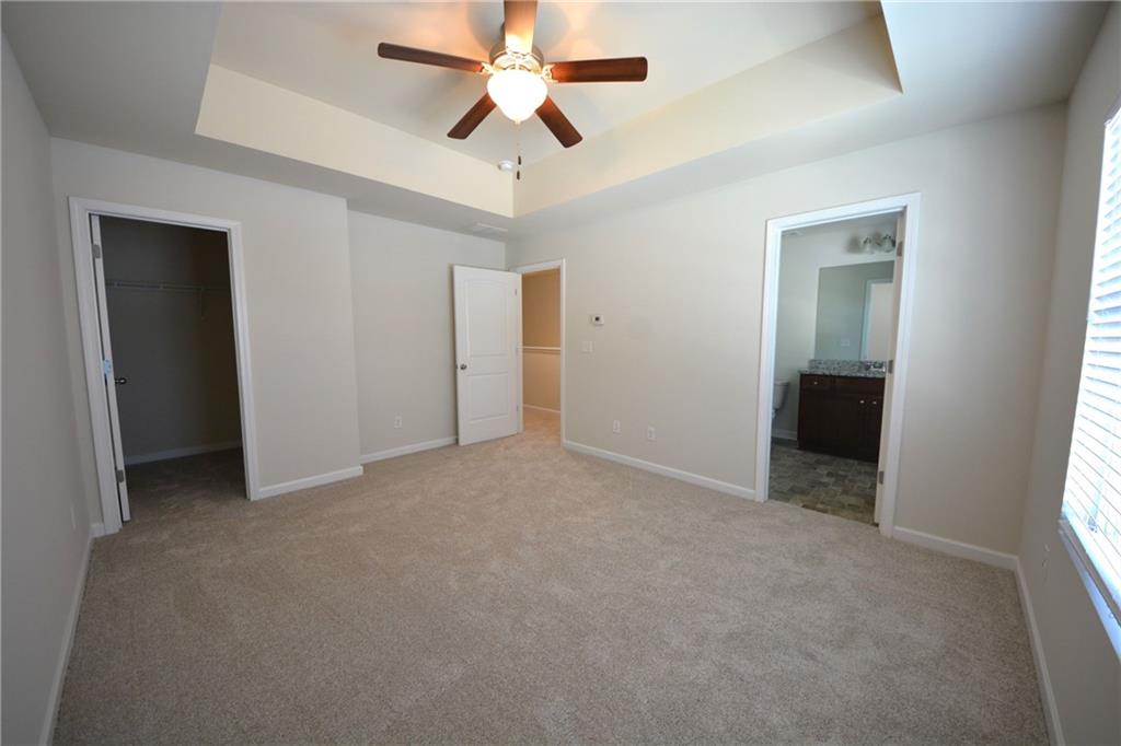 5873 Taka Lane Lithonia, GA 30038 - Photo 19 of 26 a view of an empty room with a window