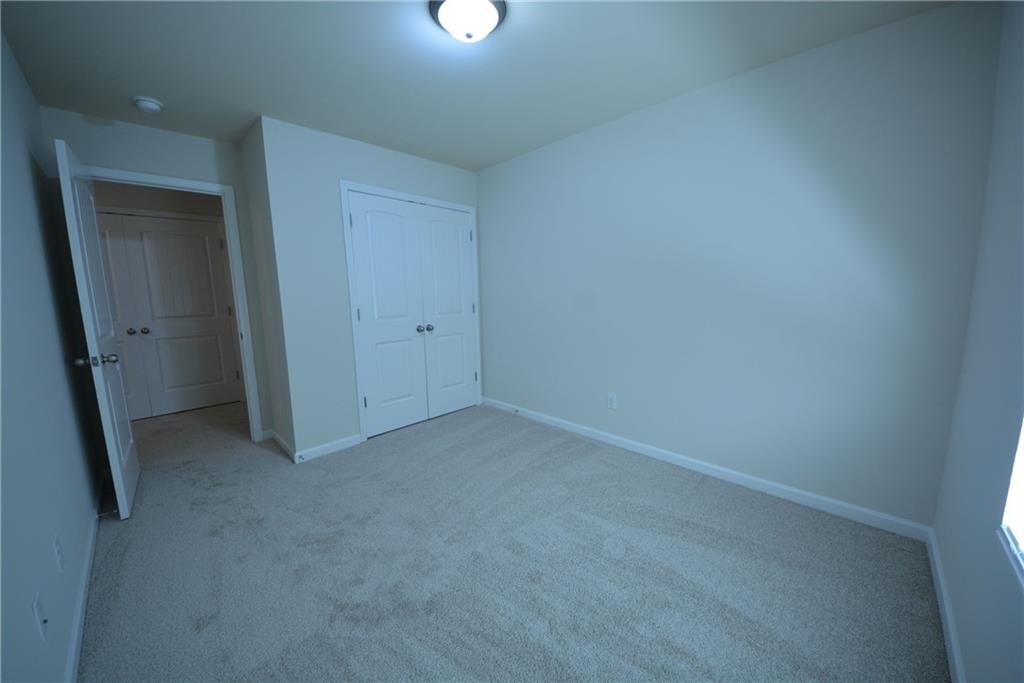5873 Taka Lane Lithonia, GA 30038 - Photo 25 of 26 an empty room with a empty space