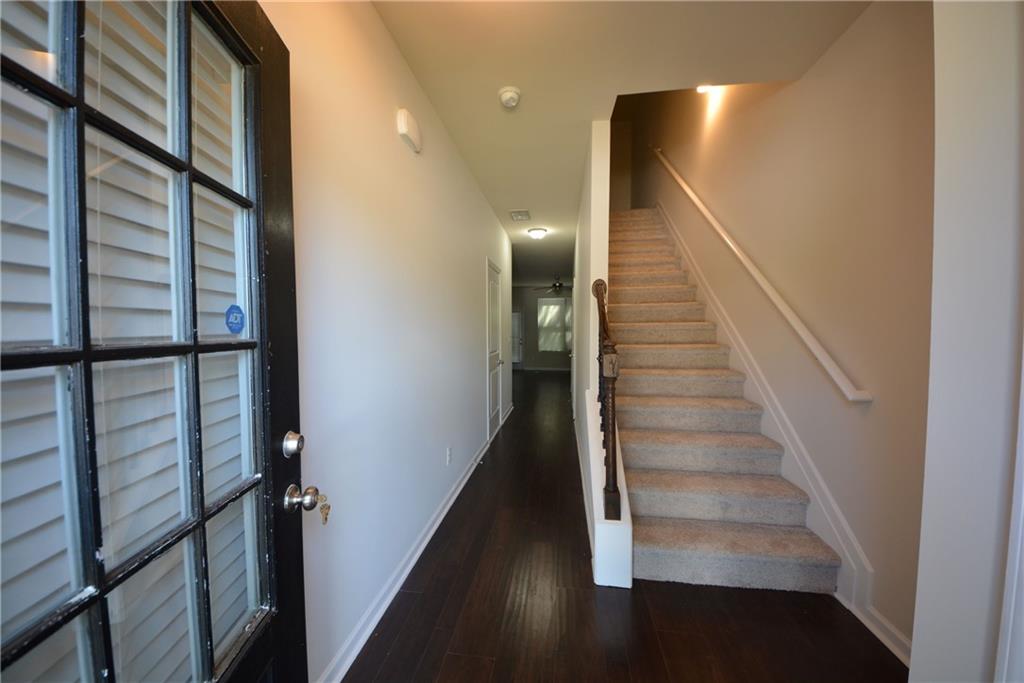 5873 Taka Lane Lithonia, GA 30038 - Photo 6 of 26 a view of entryway and hall with wooden floor
