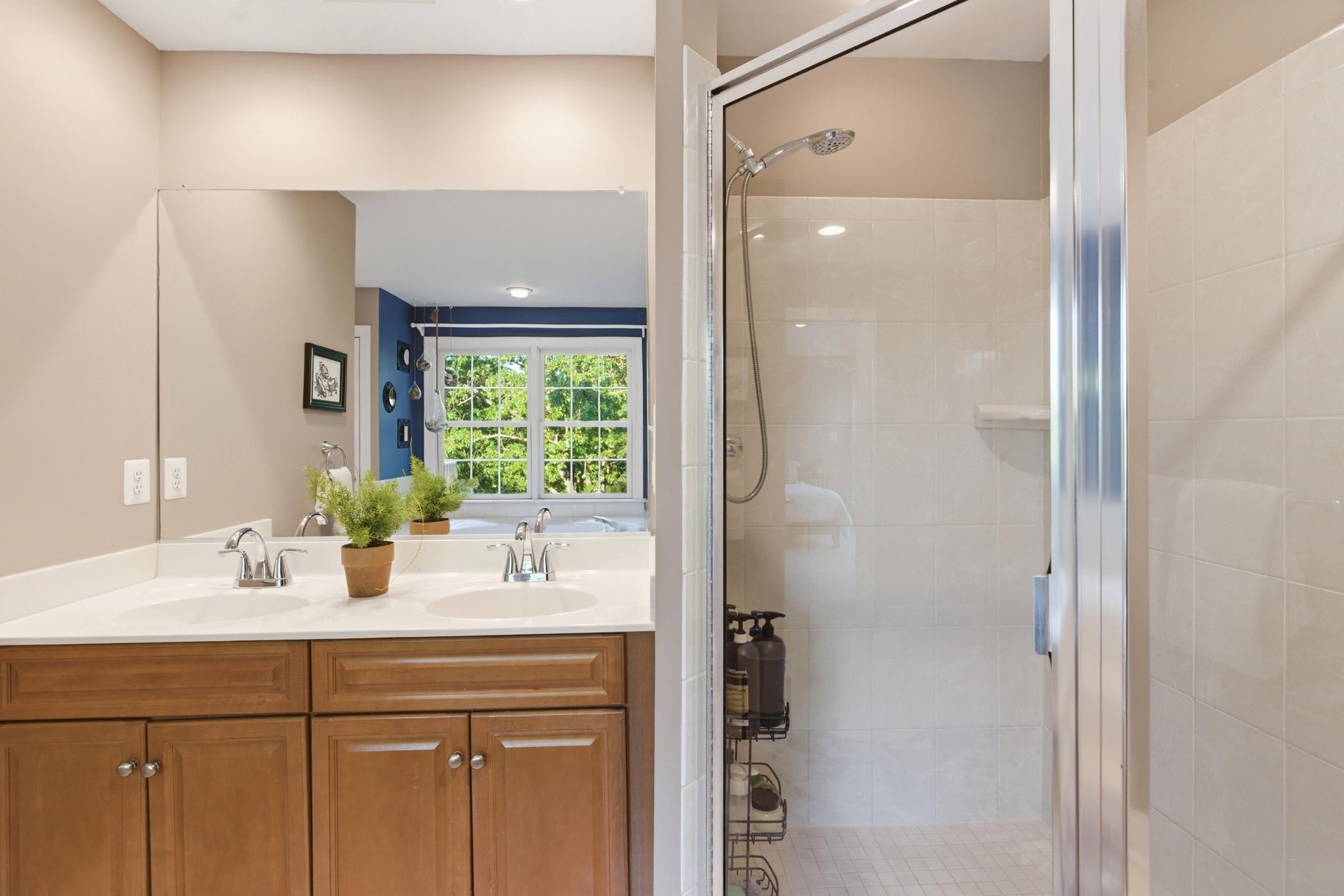 1219 Meadow View Road Pasadena, MD 21122 - Photo 31 of 70 Primary Suite modern bathroom with natural light.