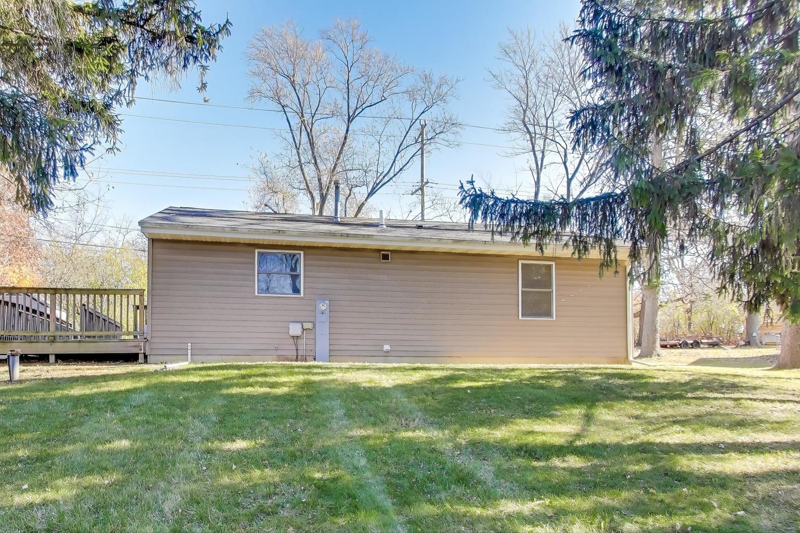 35944 North Wilson Road Ingleside, IL 60041 - Photo 20 of 26 a front view of a house with a yard