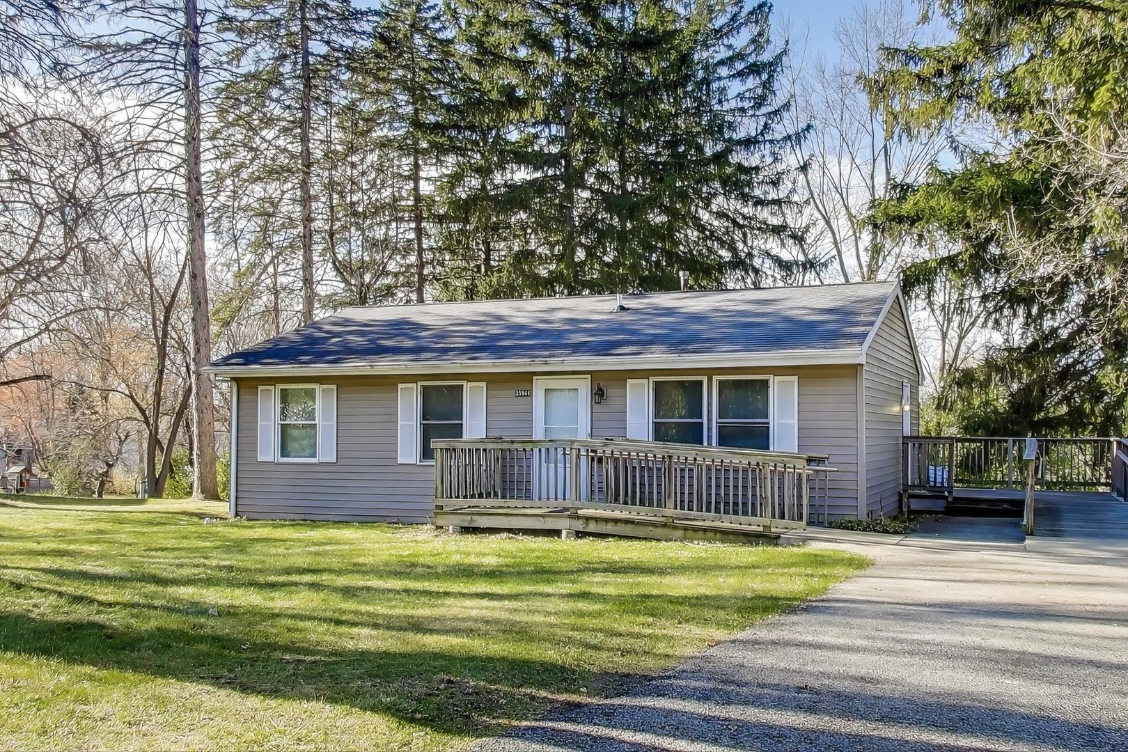 35944 North Wilson Road Ingleside, IL 60041 - Photo 2 of 26 a view of a house with a swimming pool