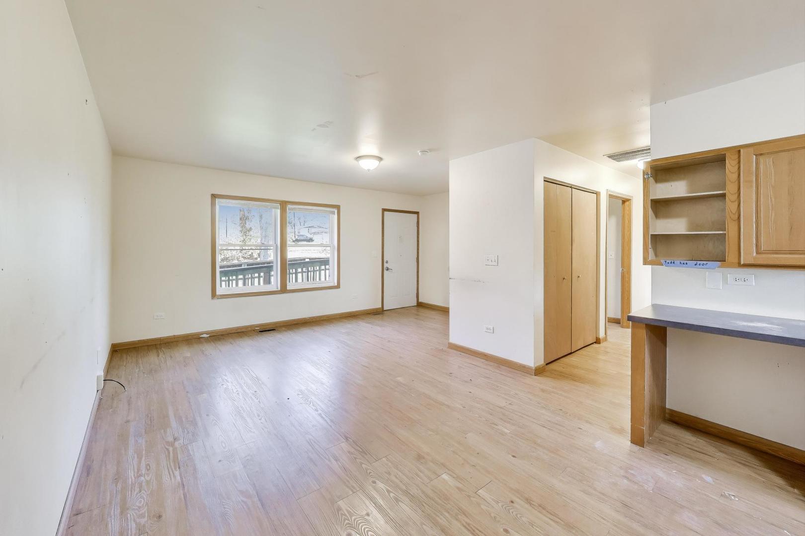 35944 North Wilson Road Ingleside, IL 60041 - Photo 6 of 26 wooden floor in an empty room with a window
