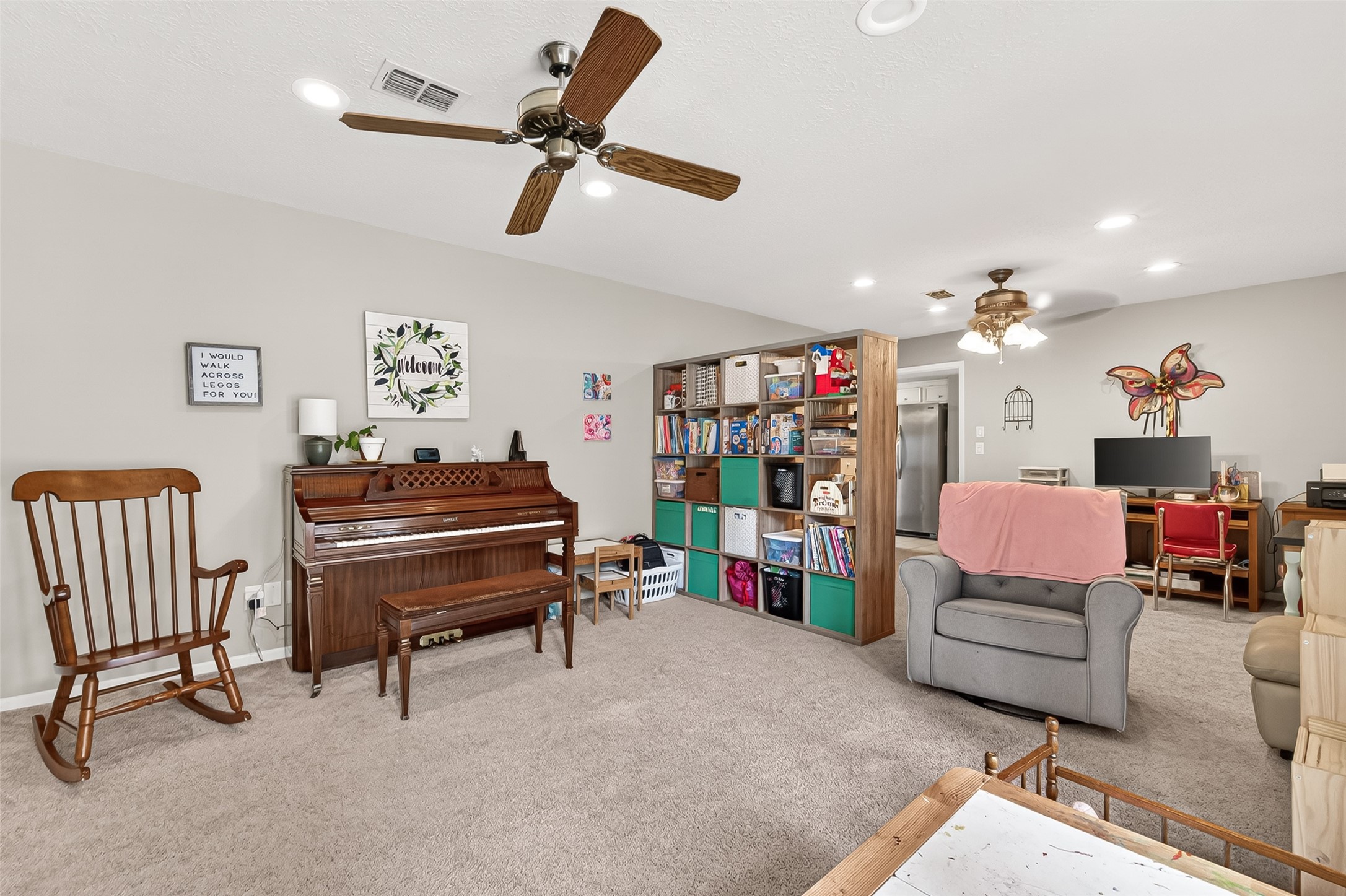 17611 Sorrell Ridge Drive Spring, TX 77388 - Photo 10 of 50 a living room with lots of furniture and a chandelier