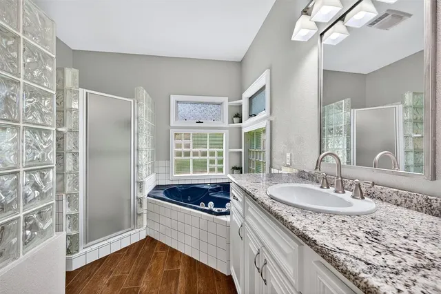 a kitchen with a sink stove and refrigerator