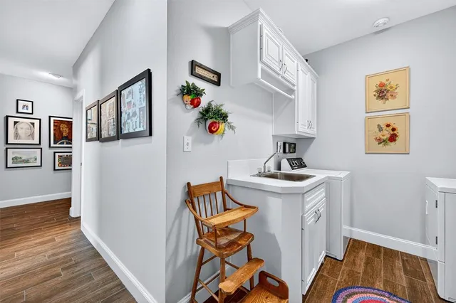 a view of living room with furniture and flat screen tv