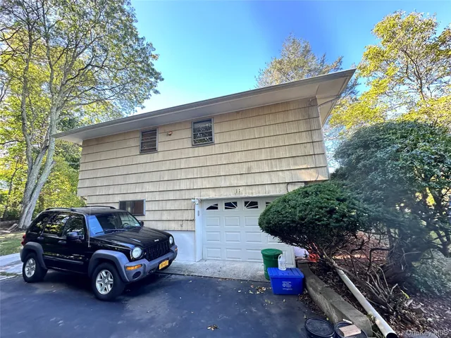 a car parked in front of a house