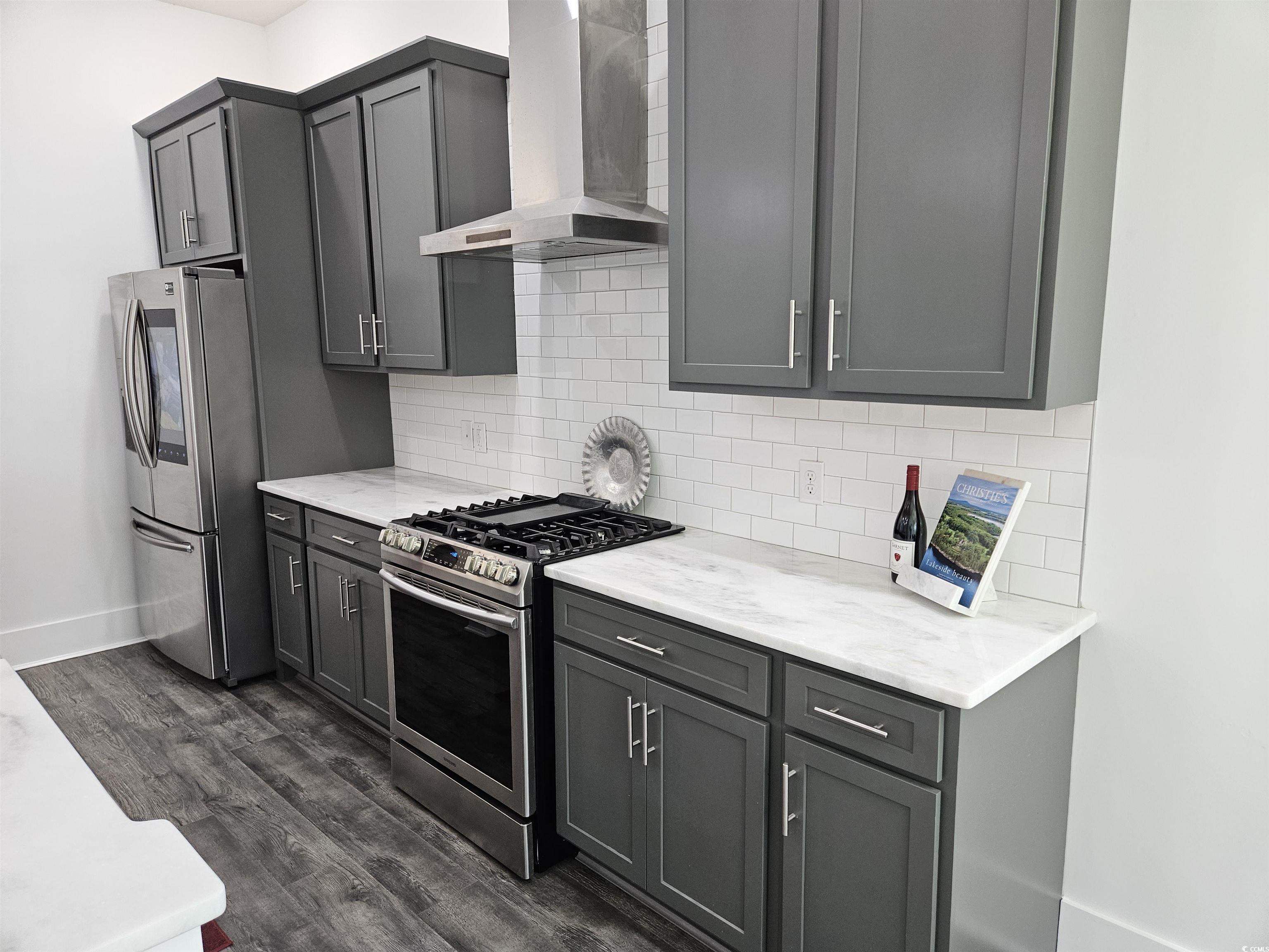 218 Rivers Edge Drive Conway, SC 29526 - Photo 10 of 40 Kitchen with gray cabinetry, stainless steel appli