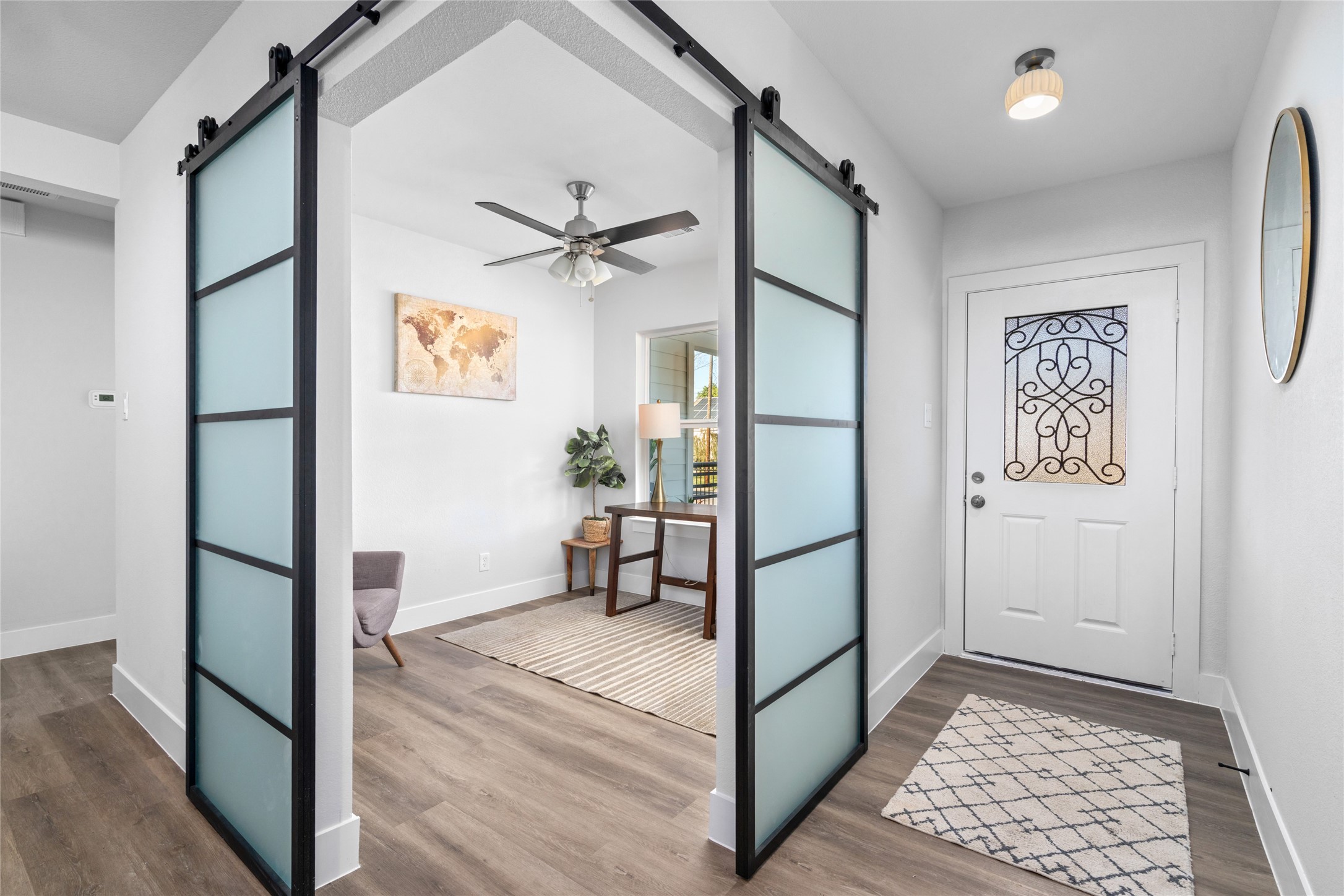 5420 Pease Street Houston, TX 77023 - Photo 11 of 43 a view of an entryway with wooden floor