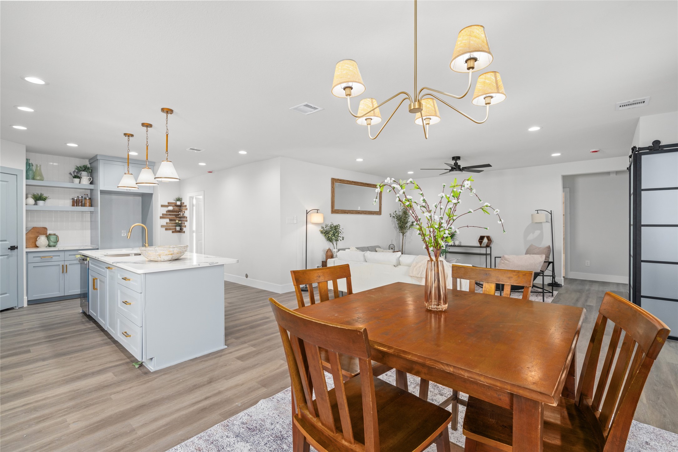 5420 Pease Street Houston, TX 77023 - Photo 24 of 43 a view of a dining room with furniture and wooden floor