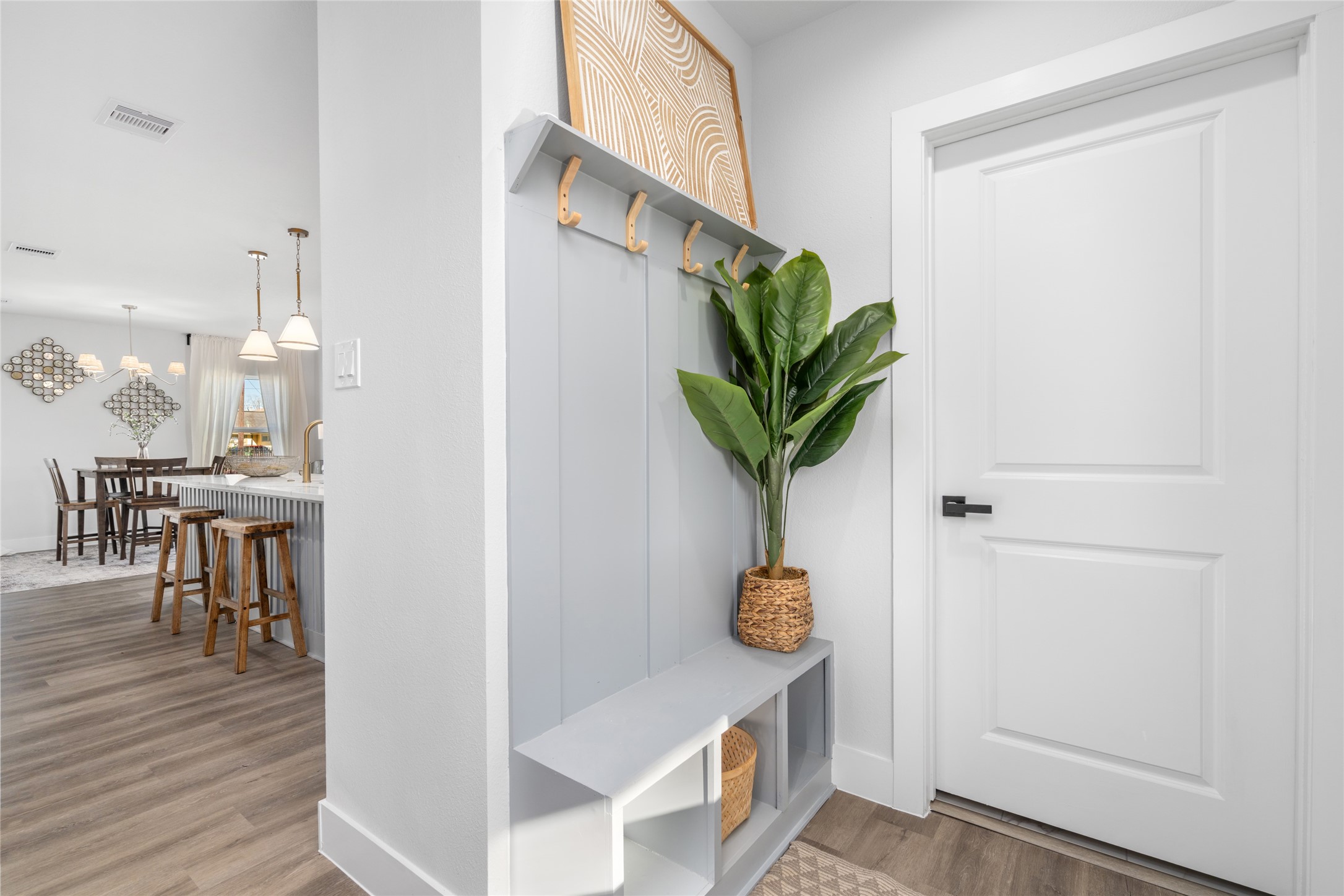 5420 Pease Street Houston, TX 77023 - Photo 27 of 43 a view of dining room with furniture and wooden floor